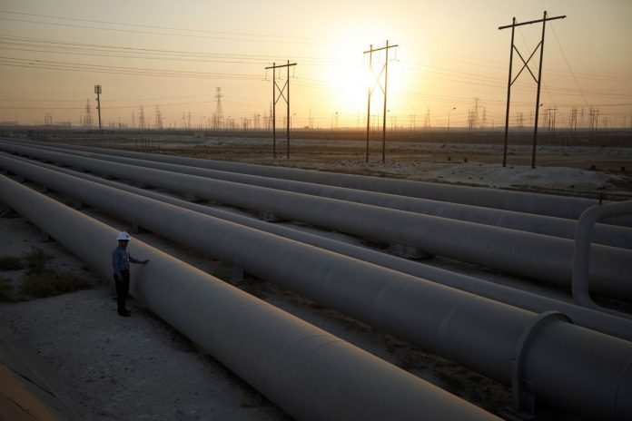 Oil Futures Sink Into Trade-War Turmoil as Brent Slips Below $70