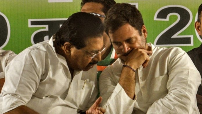 Rahul Gandhi and PC Chacko Congress president in a conversation with PC Chacko during an election rally at Ramleela Maidan in New Delhi. | ANI Photo