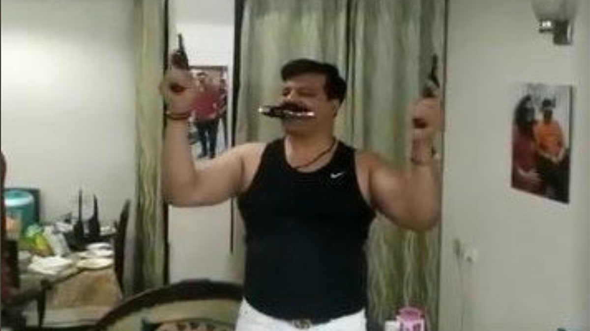 A snapshot from the viral video in which BJP MLA Pranav Singh Champion is seen dancing with guns | ANI Photo