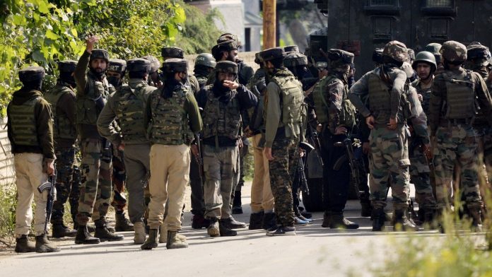 Army Army soldiers stand guard near the encounter site of a gunfight at Budgam district in central Kashmir | ANI Photo