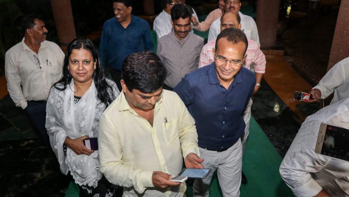 10 of 15 Congress members in the 40-member Goa Assembly arrive to meet Speaker Rajesh Patnekar, in Panaji 10 of 15 Congress members in the 40-member Goa Assembly arrive to meet Speaker Rajesh Patnekar, in Panaji