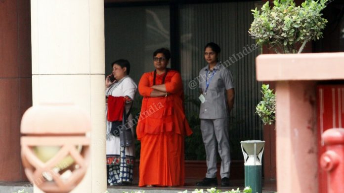 MP Pragya Singh Thakur waits for car outside Parliament House Library