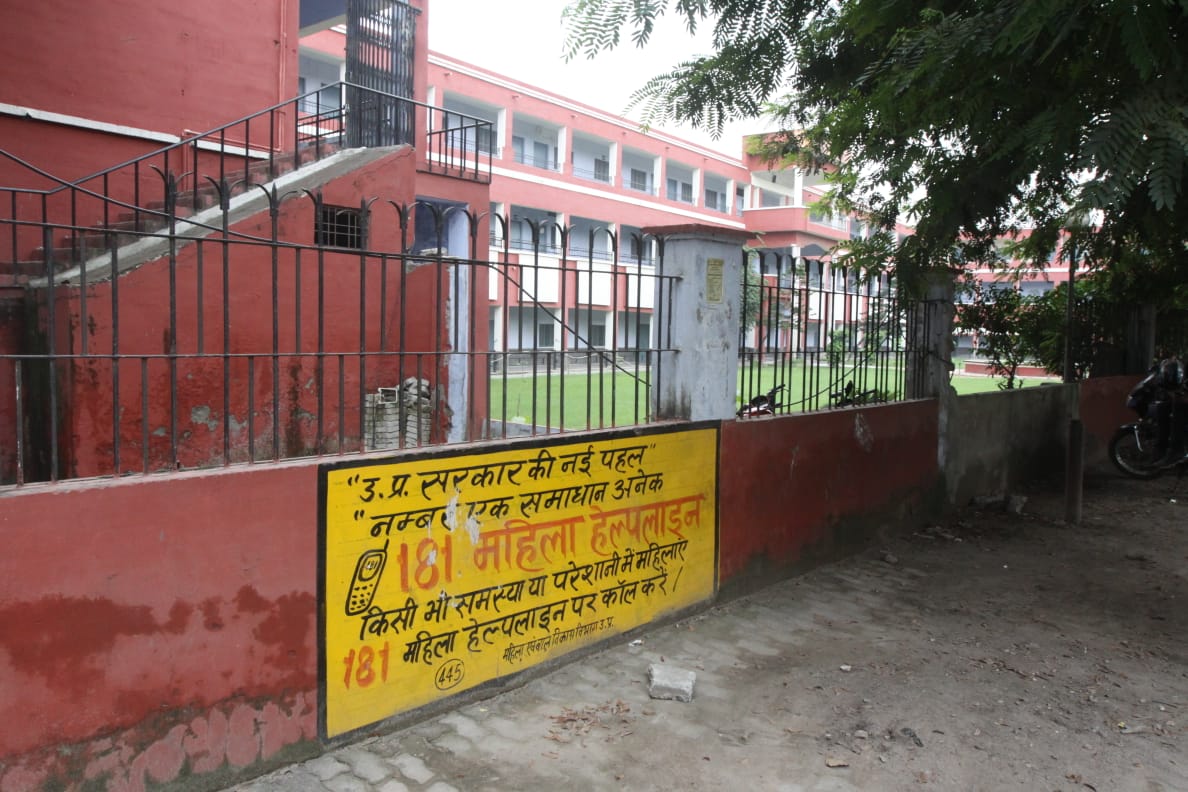 Posters of a womens helpline number outside the Mumukshu complex | Photo: Praveen Jain | ThePrint