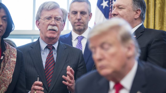 President Trump Attends Signing To Launch Women's Global Development & Prosperity Initiative John Bolton, former national security advisor, speaks before U.S. President Donald Trump signs a memorandum establishing the Women's Global Development and Prosperity Initiative (W-GDP) in the Oval Office of the White House. | Photographer: Zach Gibson | Bloomberg