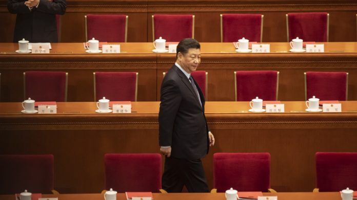 Xi Jinping attends the closing of the Second Session of the 13th National People's Congress at the Great Hall of the People in Beijing | Photographer: Qilai Shen | Bloomberg Xi Jinping attends the closing of the Second Session of the 13th National People's Congress at the Great Hall of the People in Beijing | Photographer: Qilai Shen | Bloomberg