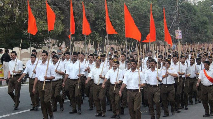 Representational Image | RSS members march with the saffron flag | Wikimedia Commons Representational Image | RSS members march with the saffron flag | Wikimedia Commons