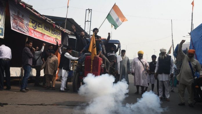 Farmers Farmers at the Ghazipur border celebrate the Centre's repeal of the farm laws Friday | ThePrint